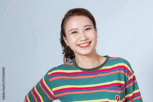 Portrait of a beautiful charming happy asian woman.