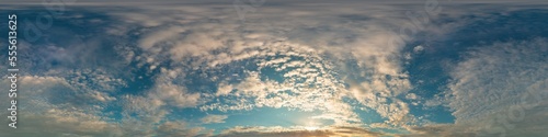 Dark blue sunset sky panorama with golden Cumulus clouds. Seamle © panophotograph