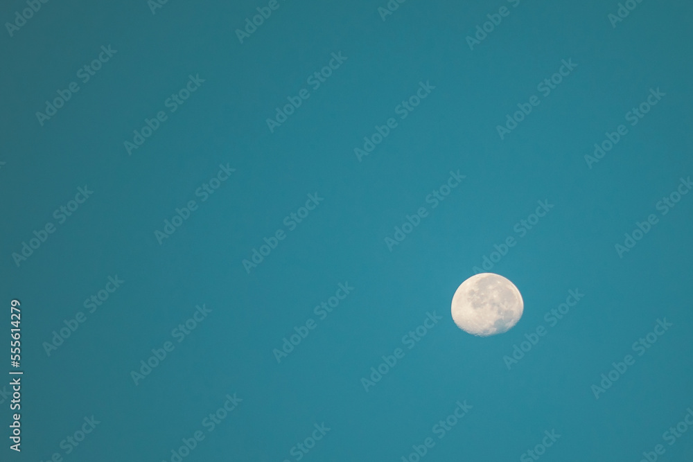 Moon at day time with copy space for your text. Moon at day time with copy space for your text.