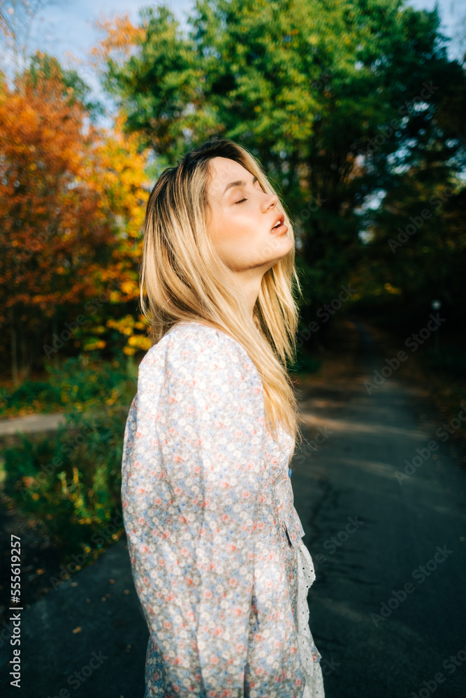 Portrait of attractive caucasian woman posing in the autumn park. Portrait of attractive caucasian woman posing in the autumn park.