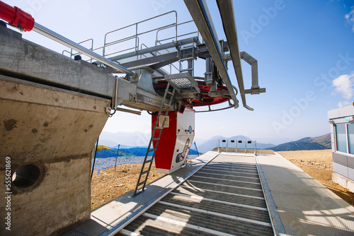 rope lift mechanism against the sky, round parts of the lift in the ski resort. ski lift mechanism 