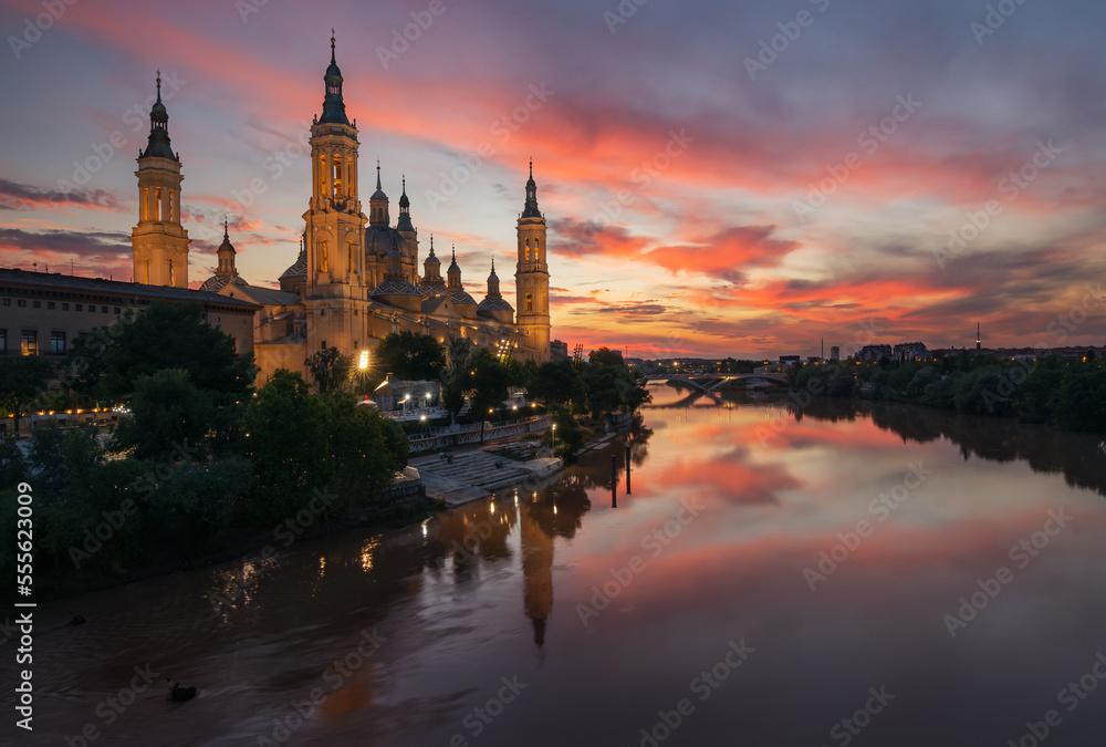 The Cathedral Basilica of Nuestra Senora del Pilar in Zaragoza. Viewpoint from the stone bridge over the ebro river.