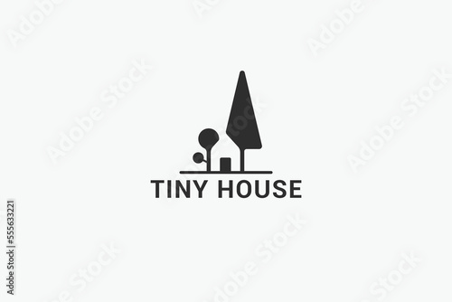 tiny house logo with a combination of a simple tiny house and trees