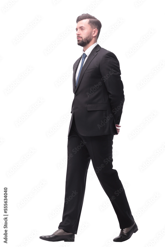 rear view. pensive businessman stepping forward . isolated on white rear view. pensive businessman stepping forward . isolated on white