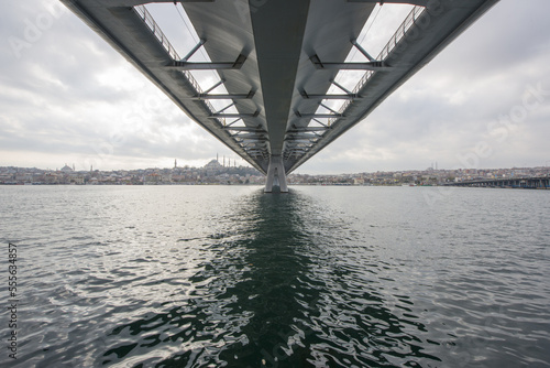 Long exposure. View of Haliç Metro Bridge connecting Azapkapı (Beyoğlu) and Unkapanı (Fatih) (Halic Metro Bridge). blue sky Istanbul Turkey