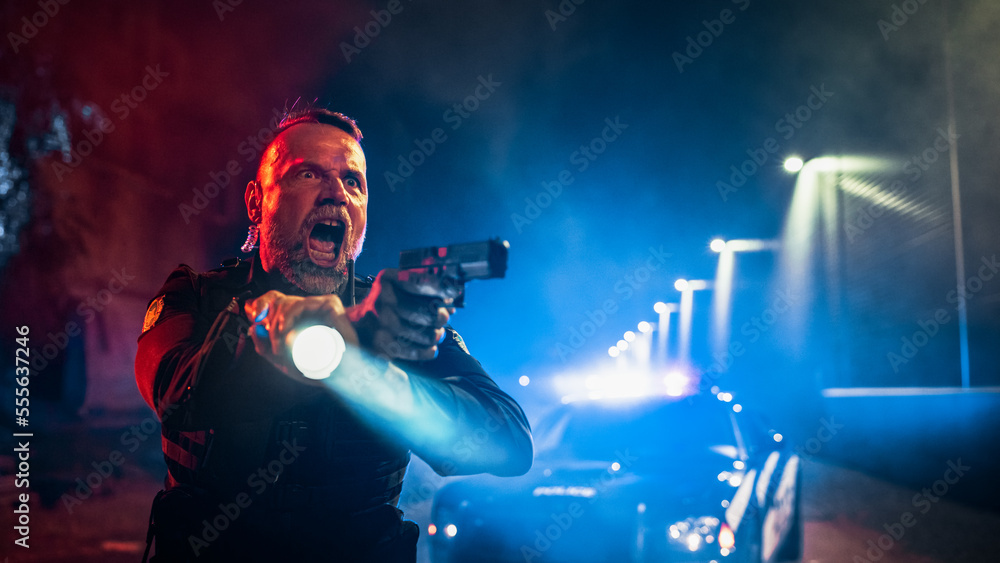 Portrait of White Male Police Officer Aiming Gun at Criminal, Orders to Drop the Weapon and Stop Resisting Arrest. Officer of the Law Fights Crime, Prevents Murder. Focusing Cinematic Portrait of White Male Police Officer Aiming Gun at Criminal, Orders to Drop the Weapon and Stop Resisting Arrest. Officer of the Law Fights Crime, Prevents Murder. Focusing Cinematic