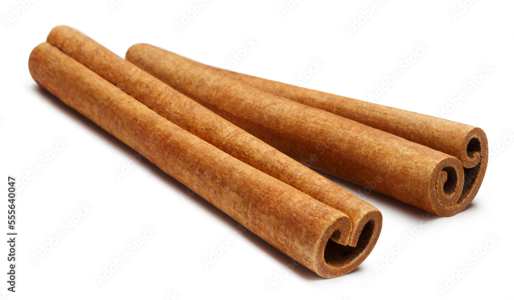 Two delicious cinnamon sticks, isolated on white background Two delicious cinnamon sticks, isolated on white background