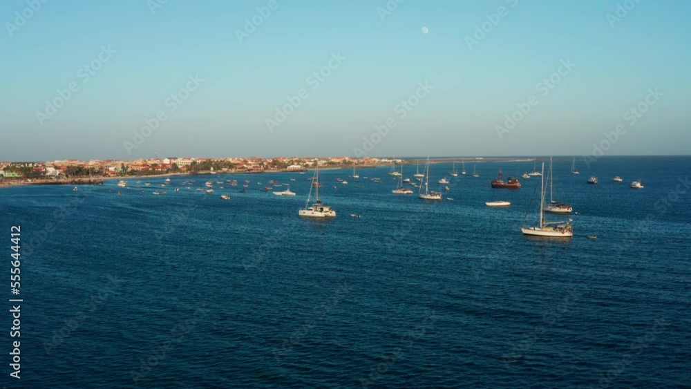 Flying over sailboats in Sal unveiling the city of Santa Maria in Cape Verde Flying over sailboats in Sal unveiling the city of Santa Maria in Cape Verde