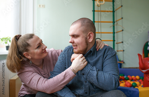 mother and autistic child in a rehabilitation center.