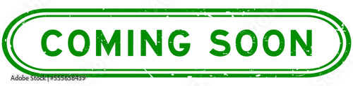 Grunge green coming soon word rubber seal stamp on white background