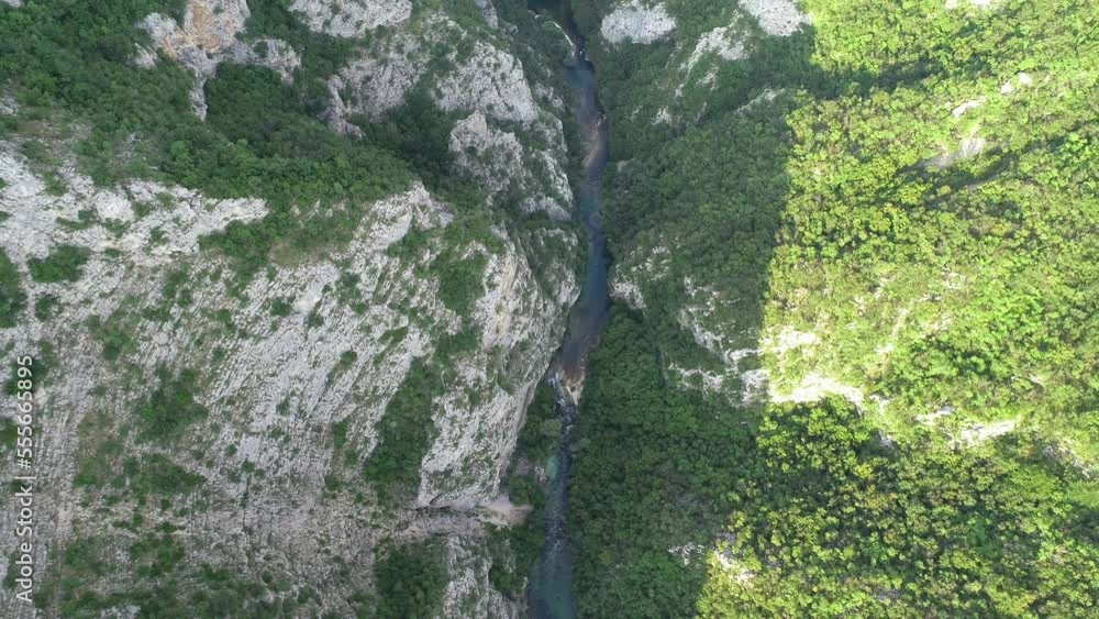 Beautiful waterfall in green forest, top view. River in a canyon, aerial drone Big Waterfall. Beautiful waterfall in green forest, top view. River in a canyon, aerial drone Big Waterfall.