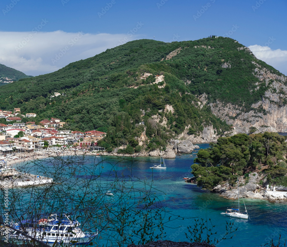 Amazing Parga town view, tiny touristic place in Greece, berth, boats, coast with a lot of hotels and restaurants, tavernas, popular tourist location
