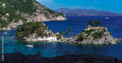 İslet of Virgin Maria in Parga, Preveze, Greece, beautiful seascape and landscape view, blue sea, horizon, mountains