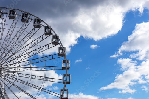 Ferris wheel opposite the cloud