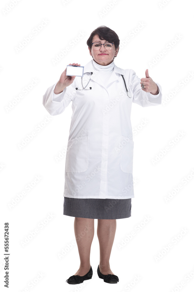 in full growth. senior female medic showing her visiting card. in full growth. senior female medic showing her visiting card.