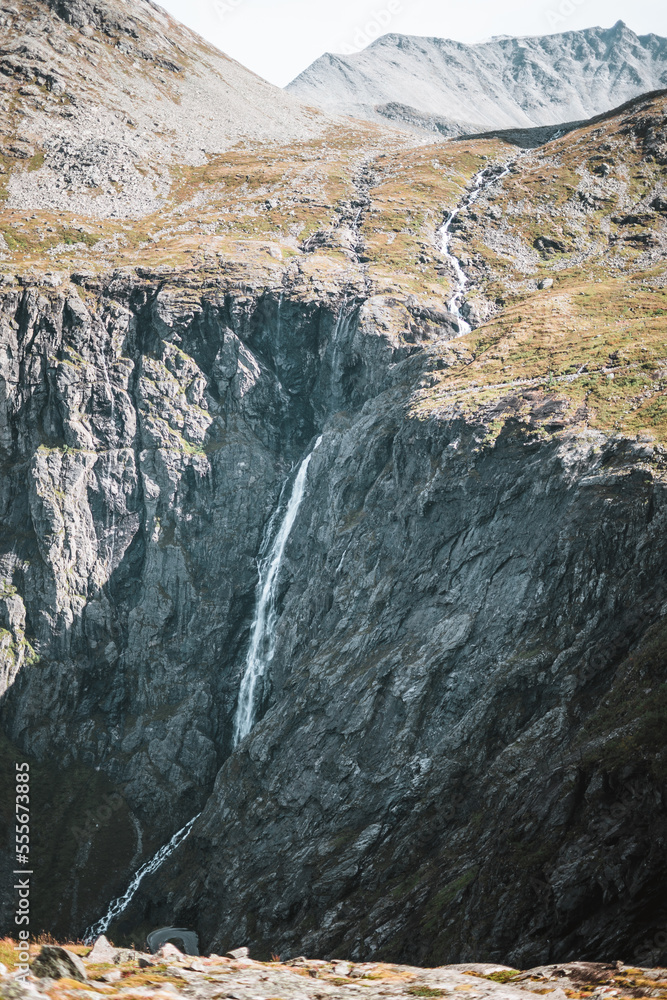 Waterfall at the trollstigen road in Norway with some mountains. Waterfall at the trollstigen road in Norway with some mountains.