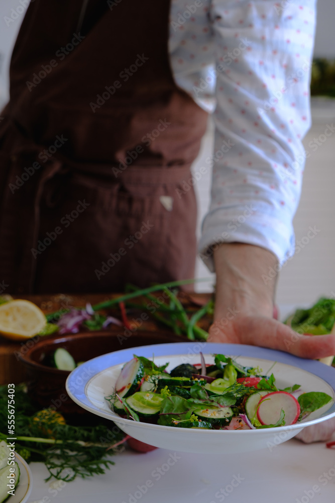 preparing a salad preparing a salad