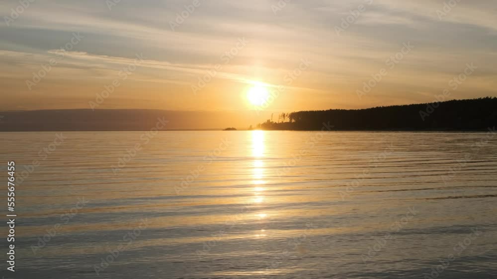 Small waves on the sea coast in the evening at sunset
Small waves on the sea coast in the evening at sunset