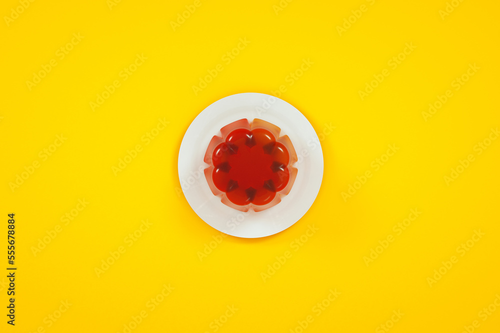 Fototapeta premium red jelly pudding on plate, 3d render, flat lay