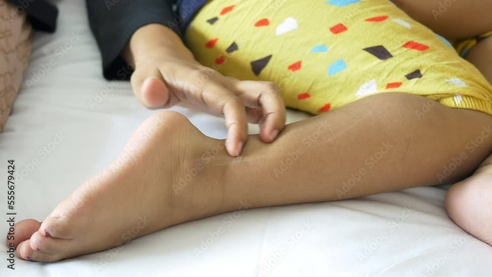 child girl suffering from itching skin, close up. child girl suffering from itching skin, close up.