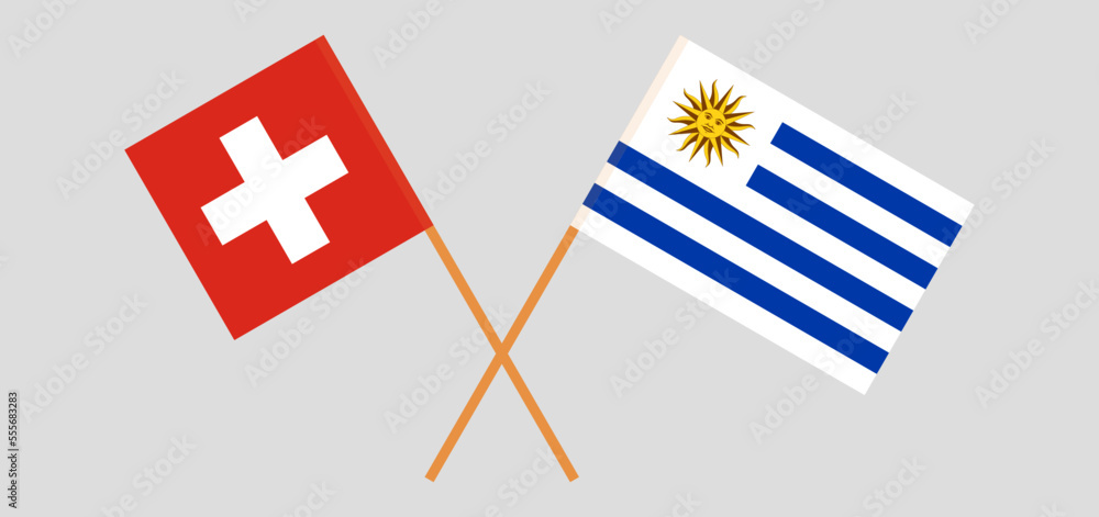 Crossed flags of Switzerland and Uruguay. Official colors. Correct proportion