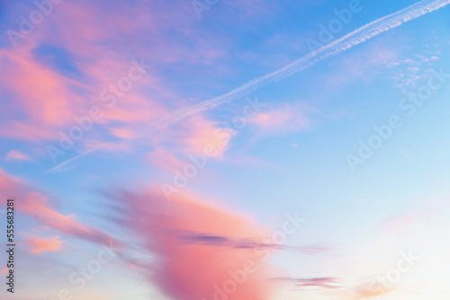 beautiful cumulus clouds at sunset, sunrise. pink, fabulous background with copy space