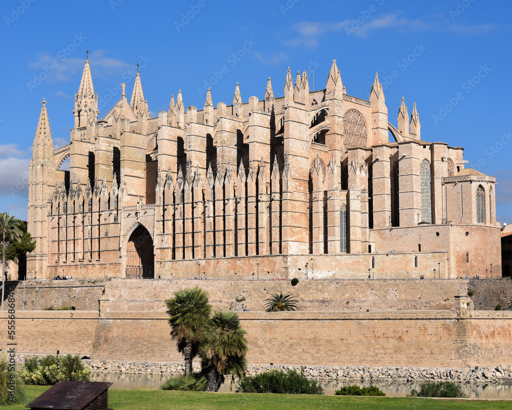 Palma de Mallorca, Spain - 7 Nov 2022: Exterior of Palma Cathedral, or Seo, from the sea front promenade