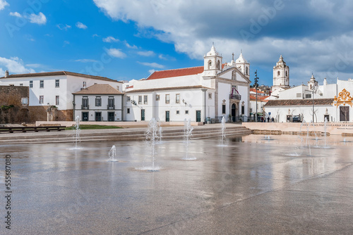 Santa Maria Church and fountain, Republic quare, Lagos, Algarve, Portugal photo