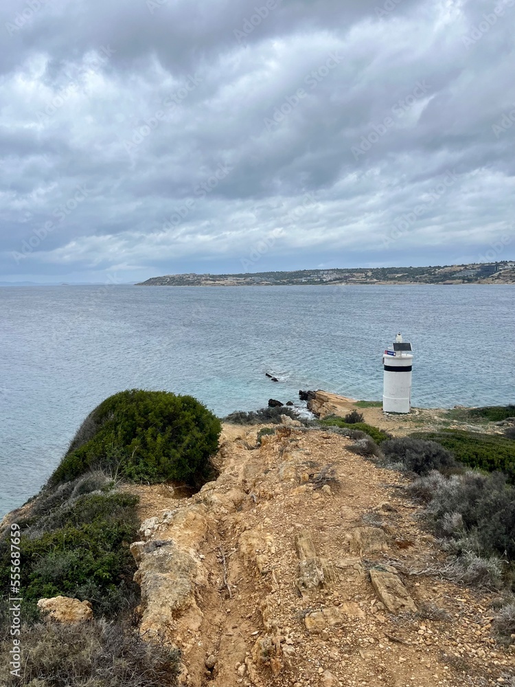 Cloudy sea view, dark clouds at the sea, rocky coast Cloudy sea view, dark clouds at the sea, rocky coast