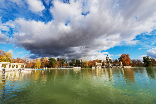 Madrid, the Buen Retiro Park (Parque del Buen Retiro) and the Monument to Alfonso XII (King of Spain) with the small lake and the public park.Community of Madrid, Spain, southern Europe.