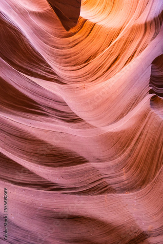 Details of the sandstone formations of Antelope canyon in Arizona with various hues of colors.