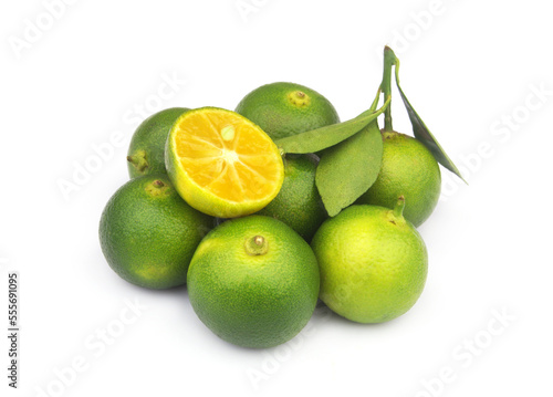 Fresh calamansi limes isolated on white background.