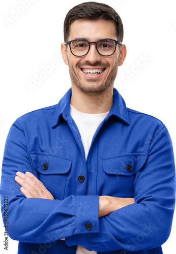 Portrait of young happy laughing man wearing blue shirt and eyeglasses, holding arms crossed