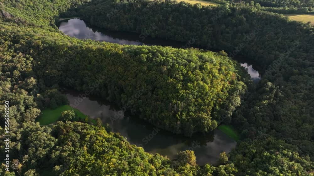 Winding river through green valley in Czech republic, South Moravia Early Morning Sunrise. Shoot on DJI MAVIC 3 Winding river through green valley in Czech republic, South Moravia Early Morning Sunrise. Shoot on DJI MAVIC 3