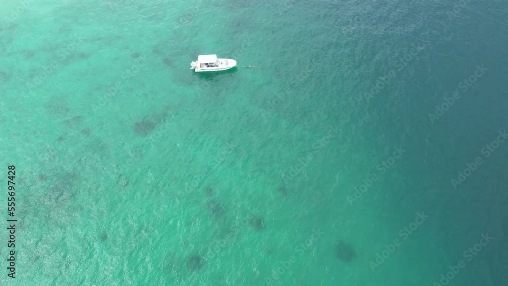 View of a tropical island in the sea, aerial shot View of a tropical island in the sea, aerial shot