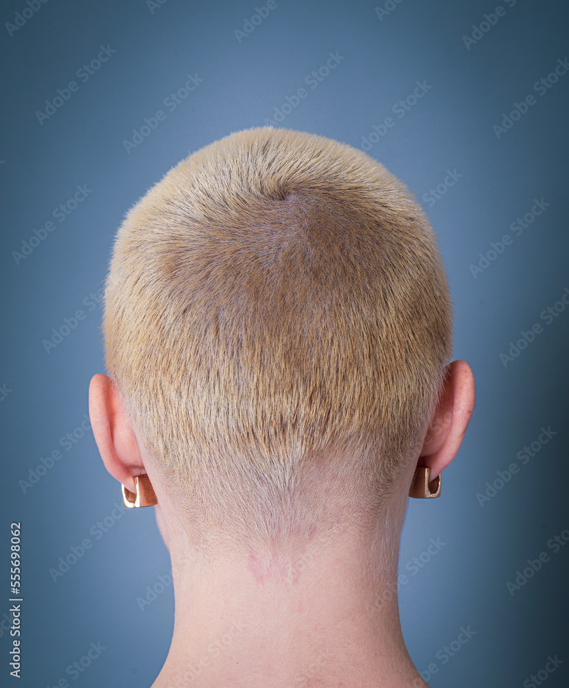 portrait of a woman with short blonde hair from behind portrait of a woman with short blonde hair from behind