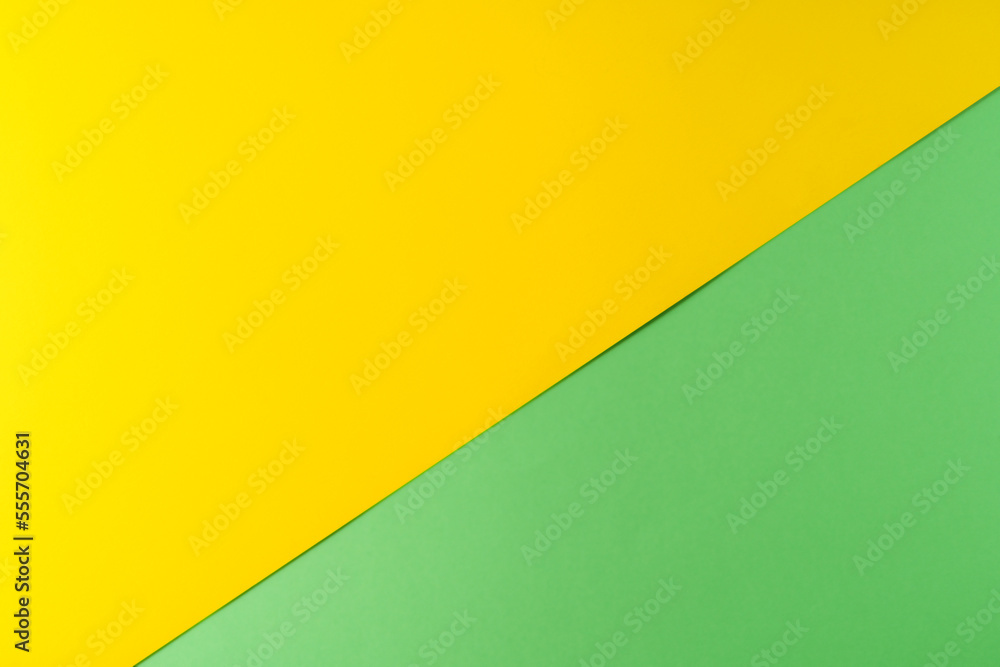 Background of green and yellow textured paper of pastel colors, geometric pattern. Background of green and yellow textured paper of pastel colors, geometric pattern.