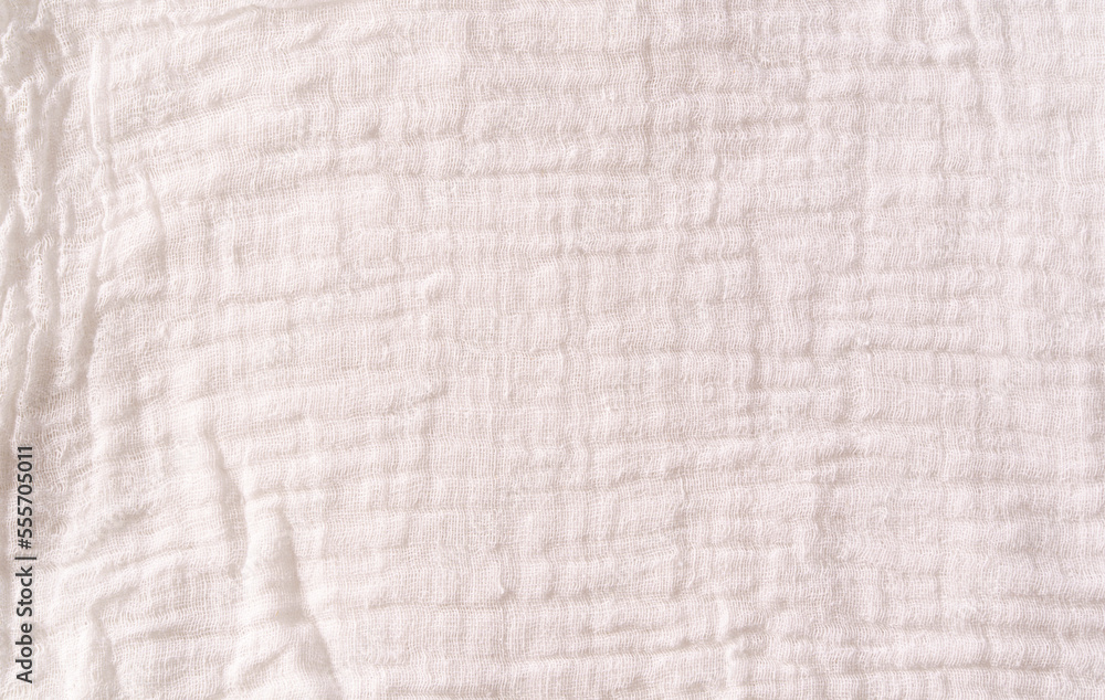 White gauze crumpled fabric background, top view. White gauze crumpled fabric background, top view.