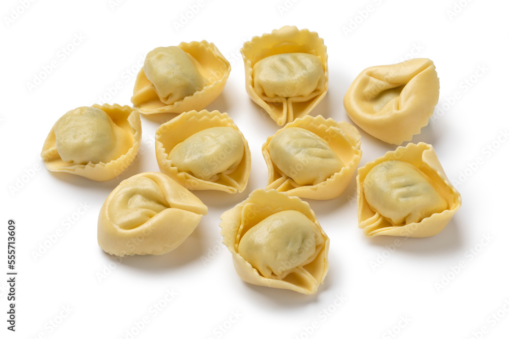 Fresh made traditional Italian tortellini stuffed with Ricotta and Spinach full frame close up as background  
