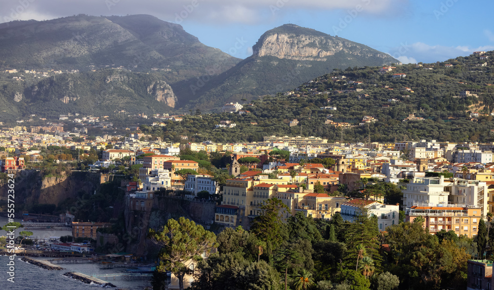 Rocky Coast and Homes in Touristic Town, Sorrento, Italy. Amalfi Coast. Sunny Evening