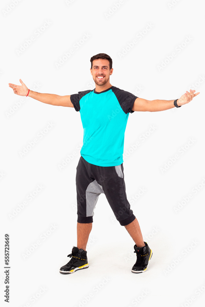 Happy fitness instructor. Happy zumba instructor. Male fitness model.