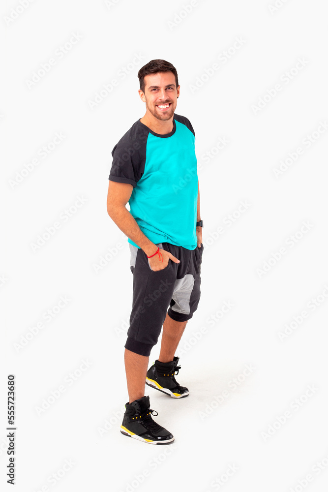 Happy fitness instructor. Happy zumba instructor. Male fitness model.