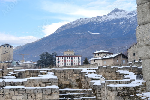 Aoste, Italy - December the 20th 2022: Some Roman ruins under the snow. © Yann Vernerie