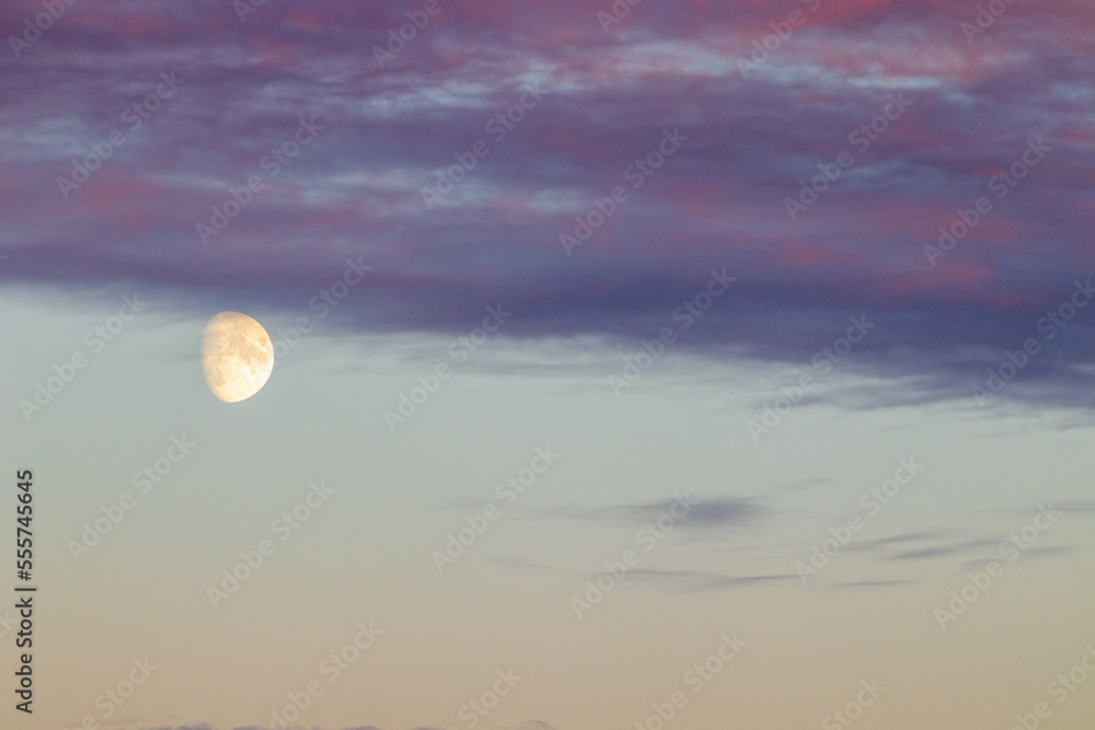 moon rising with clouds
