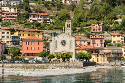 View on the Holy Trinity Church situated in Argegno village  on the shore of Lake Como, Lombardy, Italy