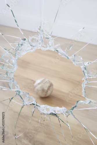 Baseball and Broken Window photo