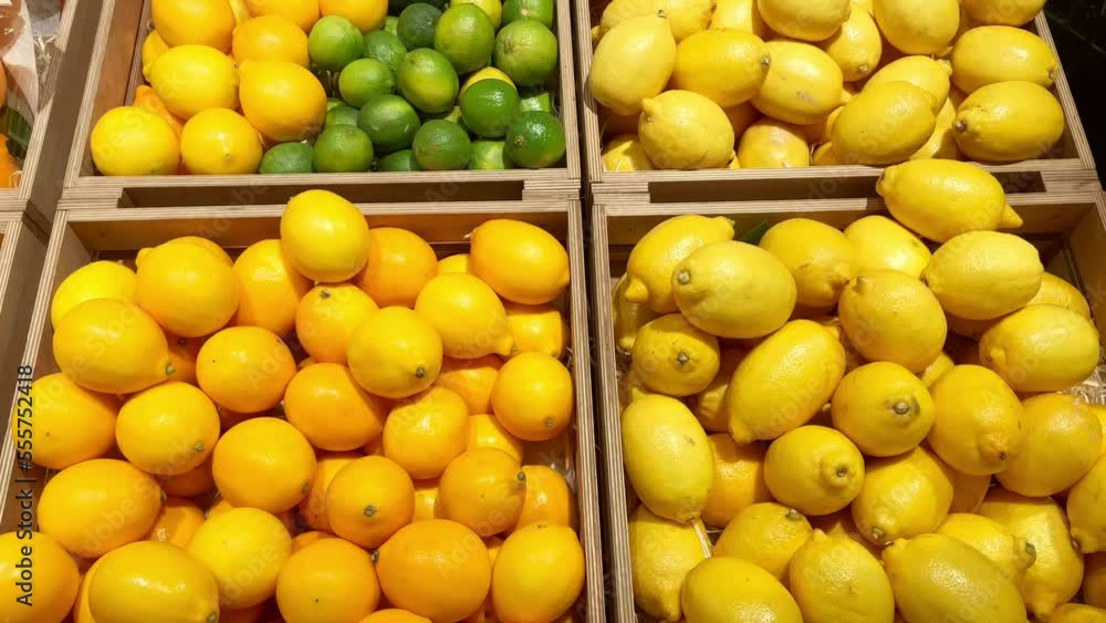 buying fruits in the market (lemons, oranges, limes) buying fruits in the market (lemons, oranges, limes)