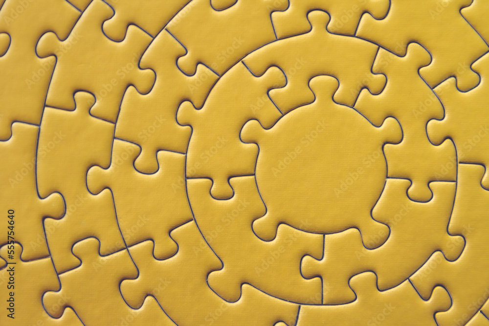 Yellow circular puzzle background Yellow circular puzzle background