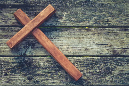 Wooden cross on wood boards