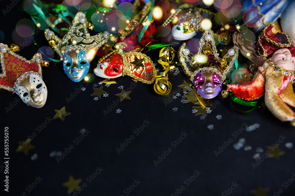 carnival masks, confetti and serpentine, happy Mardi Gras in italian holiday card. parade Shrove Tuesday or Fat Tuesday in Italy